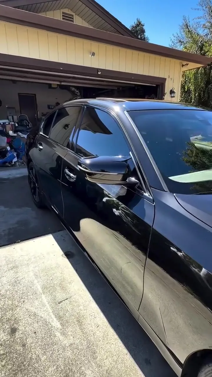 Side profile of a BMW after a full exterior and interior detail